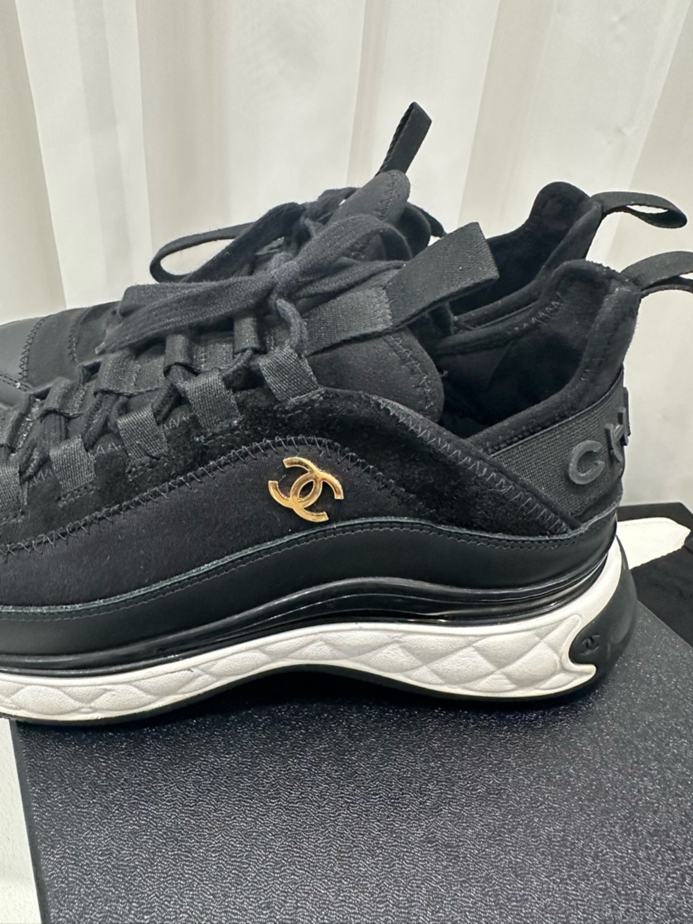 CHANEL Black Mens Sneakers with Gold CC Emblem